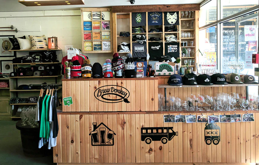 A retail store display featuring Brew Donkey
merch