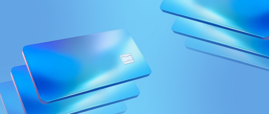 Graphic representation of business credit cards stacked against a gradient
background
